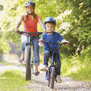 Family On Cycle Ride In Countryside
